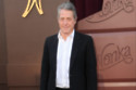 Hugh Grant loves playing 'angry little men' on the big screen