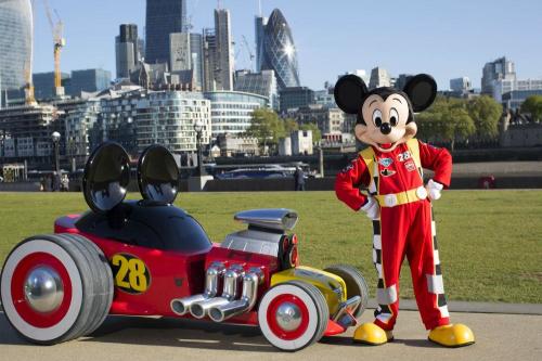 Mickey Mouse races around London in Roadster motor