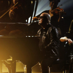 Billy Joel performs at the Grammy Awards