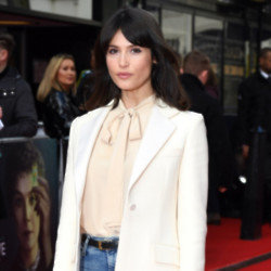 Gemma Arterton showed off her baby bump during an event in London