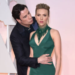 John Travolta and Scarlett Johansson at the 2015 Oscars / Photo Credit: Rollins-AA15/AFF/PA Images