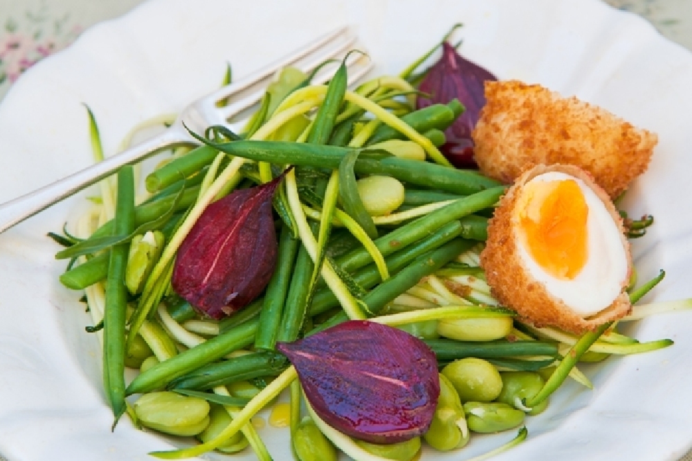 Crispy eggs with a summer salad