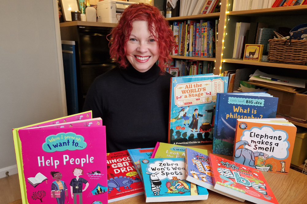 Sarah with some of her books