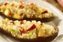 Baked aubergine stuffed with plum & nectarine couscous