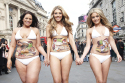 The three girls walked around Piccadilly Circus 