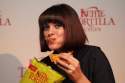 Dawn Porter opens a bag of chips