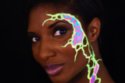 Denise Lewis with UV paint