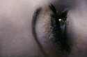 Use glitter to give a subtle glint to the eye