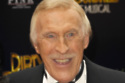 Sir Bruce Forsyth has died aged 89 / Credit: VMJM/FAMOUS