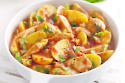 Spicy potatoes with chicken and tomato