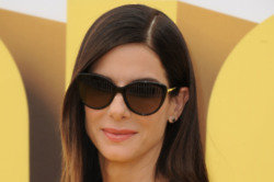 Sandra Bullock 'Absolutely Besotted' With Bryan Randall
