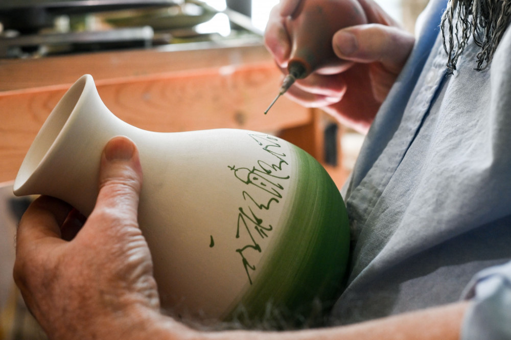 A rare Chinese vase has sold for £1.5 million after being spotted in a kitchen