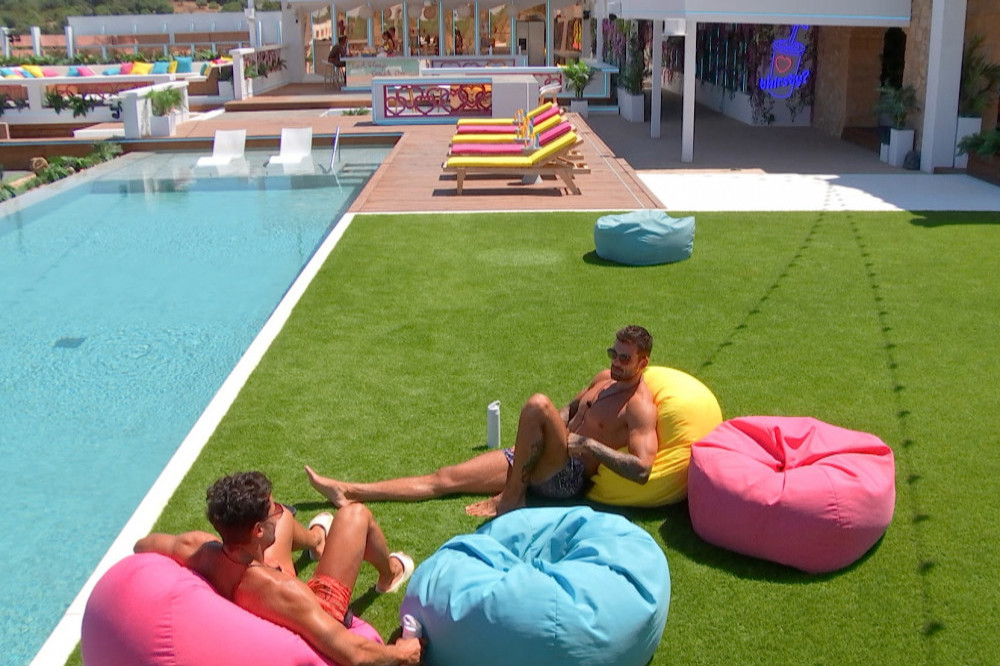 Adam Collard gives Davide Sanclimenti some advice in Monday night's episode of Love Island