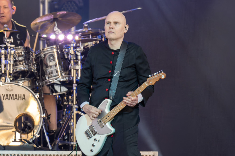 Billy Corgan considered giving up the guitar after his father's death