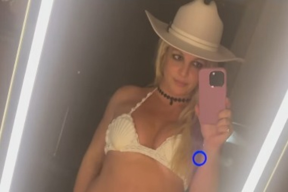 Britney Spears says she has lost two inches off her waist