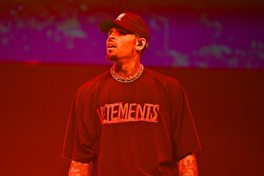 Chris Brown and his entourage are being sued for $50 million for the alleged ‘brutal’ and ‘violent’ assault' of four concertgoers