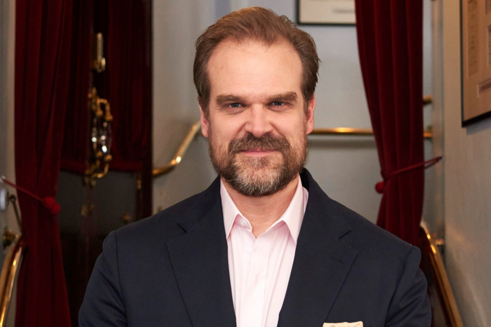David Harbour will play a retired racecar driver