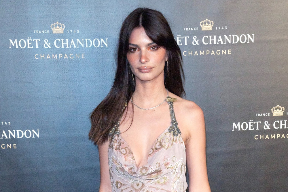 Emily Ratajkowski dropped a hint about her romance with Harry Styles