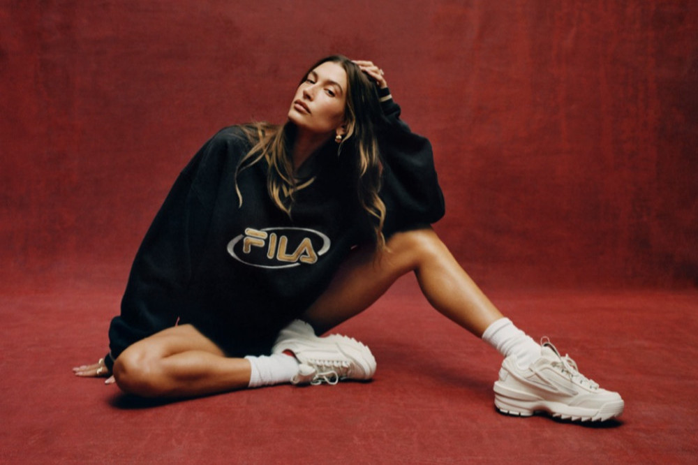 Hailey Bieber posing for FILA