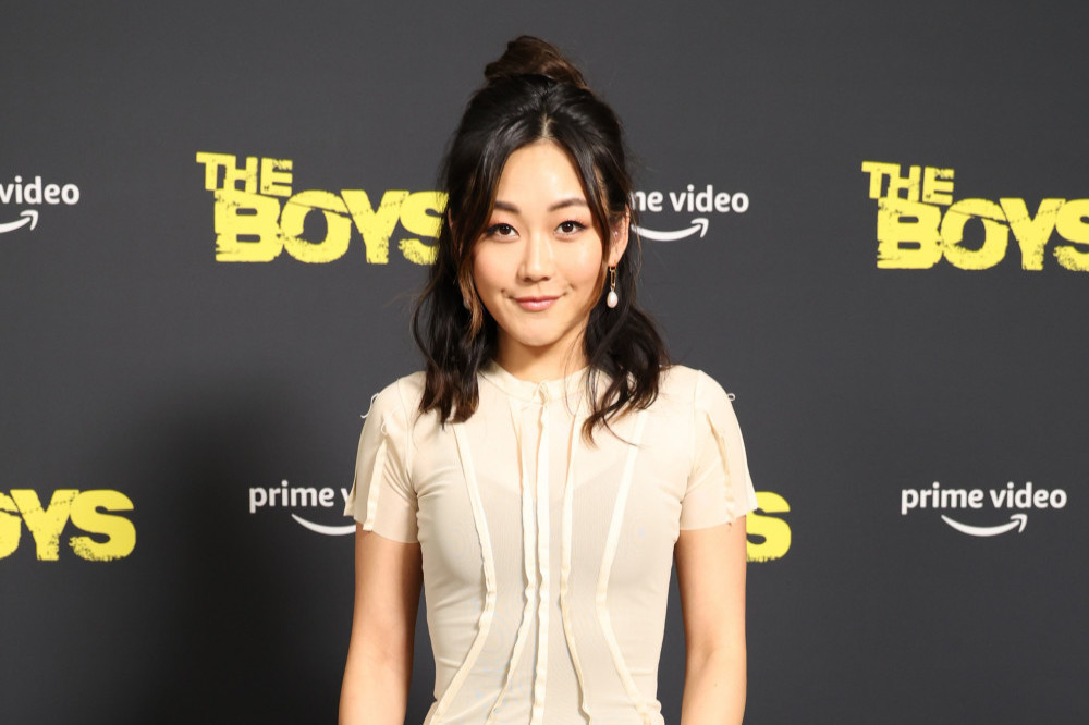 Karen Fukuhara has revealed the invaluable advice Margot Robbie and Cara Delevingne gave her