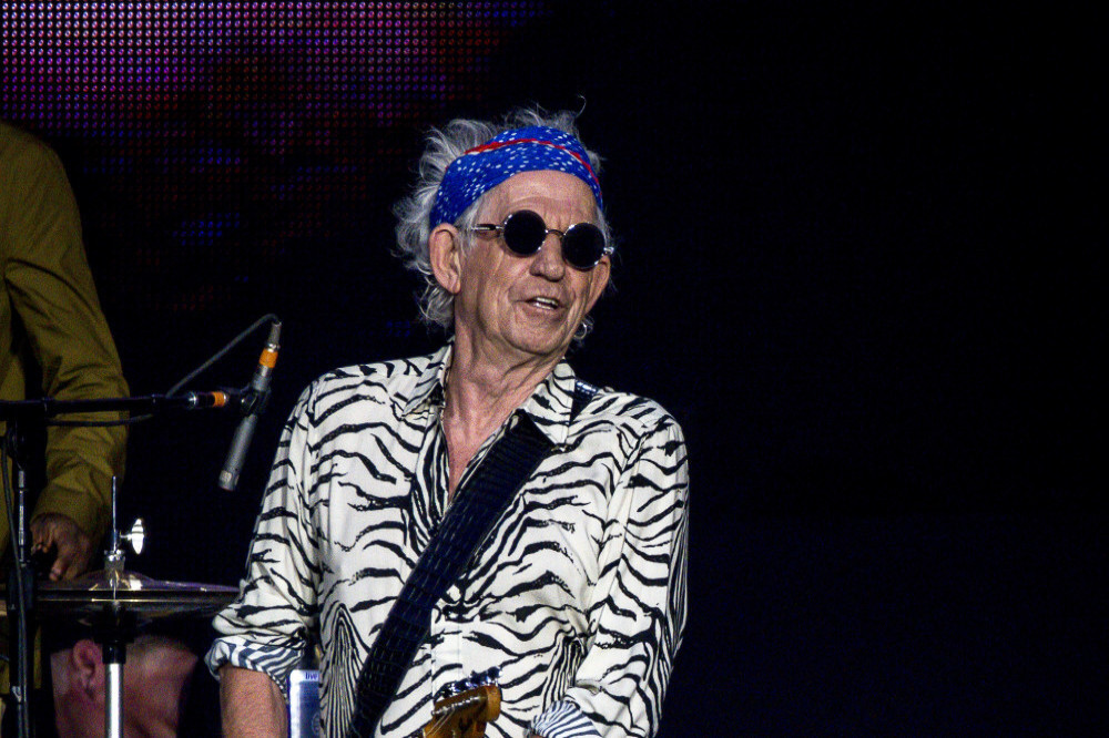Keith Richards got so out of his mind on tour with the Rolling Stones he was flown to another country while still in bed