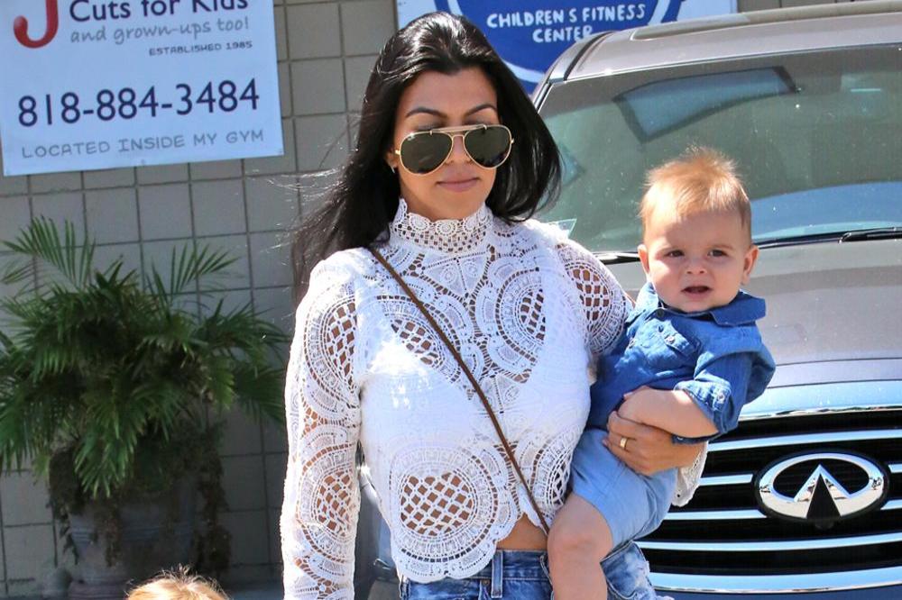 Kourtney Kardashian with daughter Penelope and son Reign