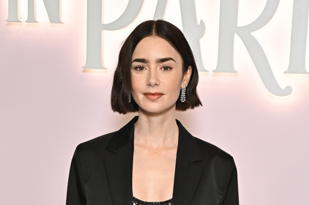 Lily Collins would love to film the show in London