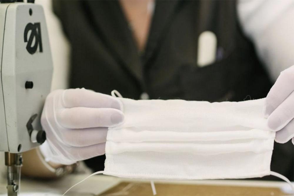 Louis Vuitton is producing hospital gowns and hundreds of