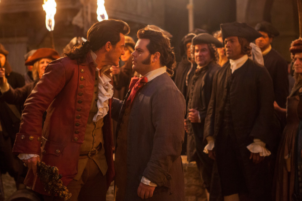 Luke Evans and Josh Gad in Beauty and the Beast