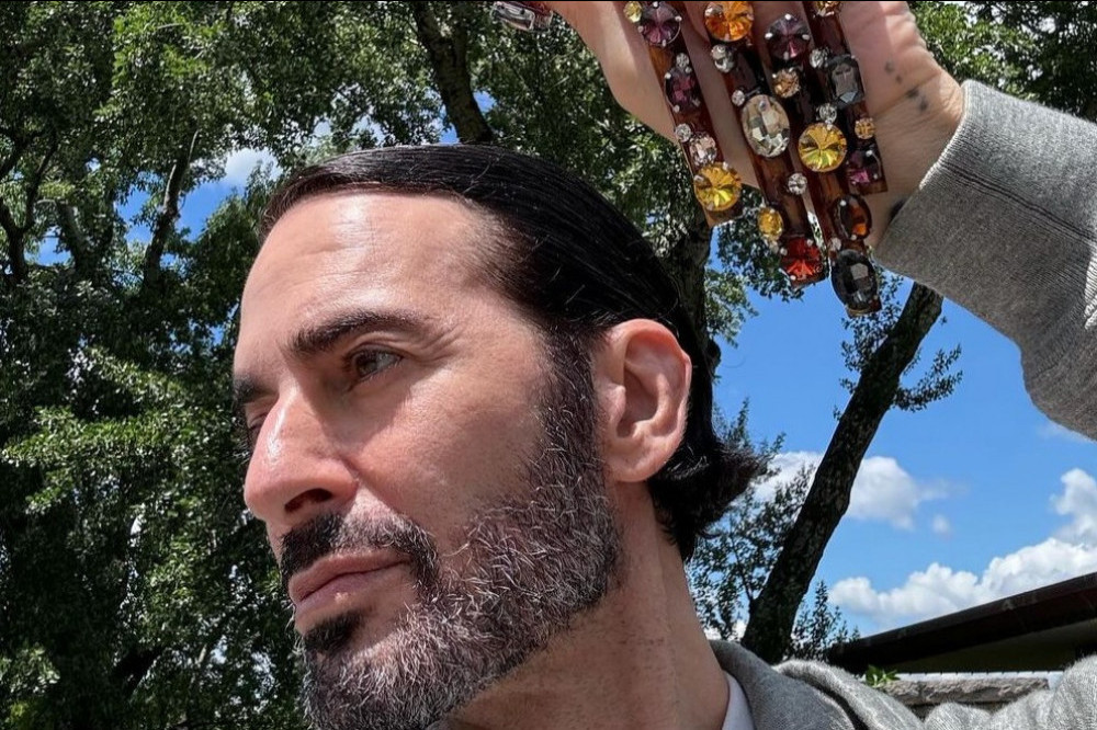 Marc Jacobs is loving his long nails