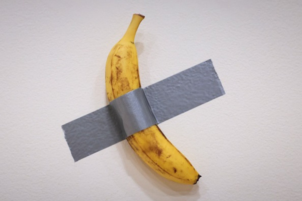 Maurizio Cattelan's Comedian artwork - a banana duct-taped to a wall - has sold for $6.2 million