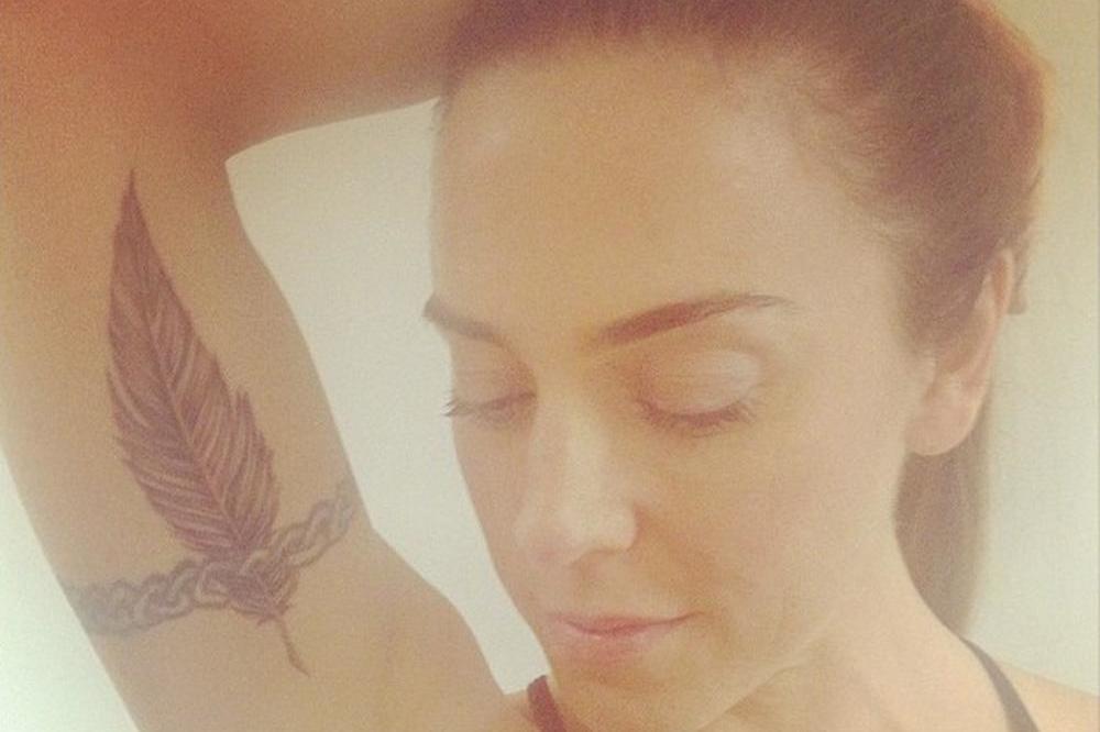 Mel C shows off new tattoo