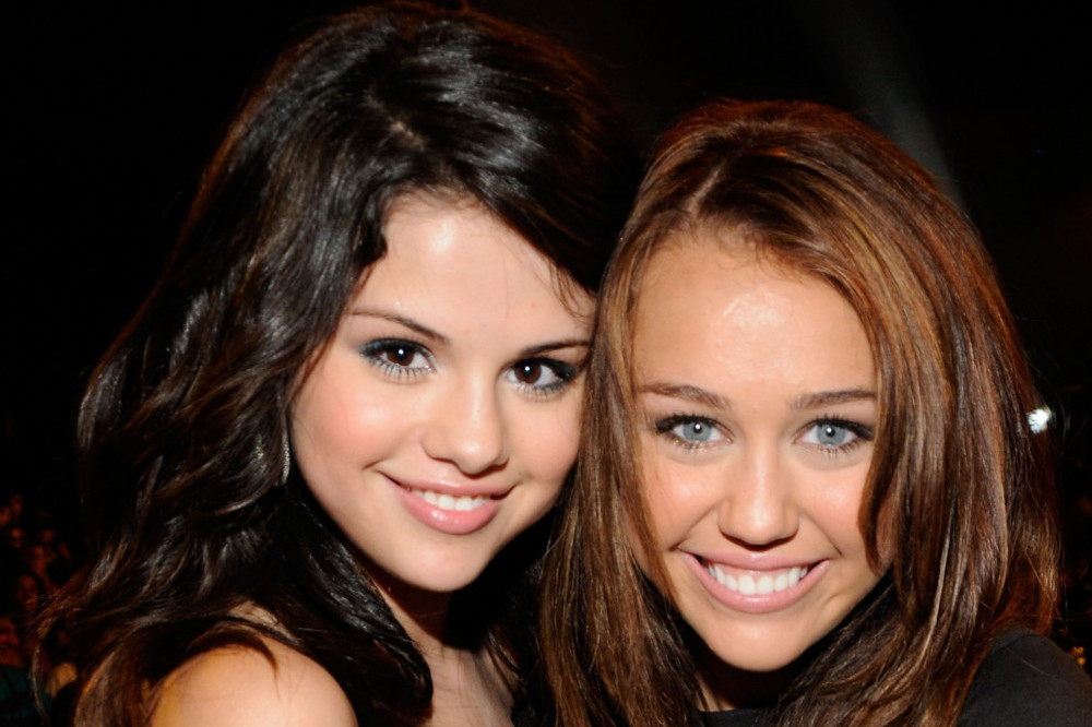Miley Cyrus and Selena Gomez did not always get along during their Disney days, according to Wizards of Waverly Place star Jennifer Stone