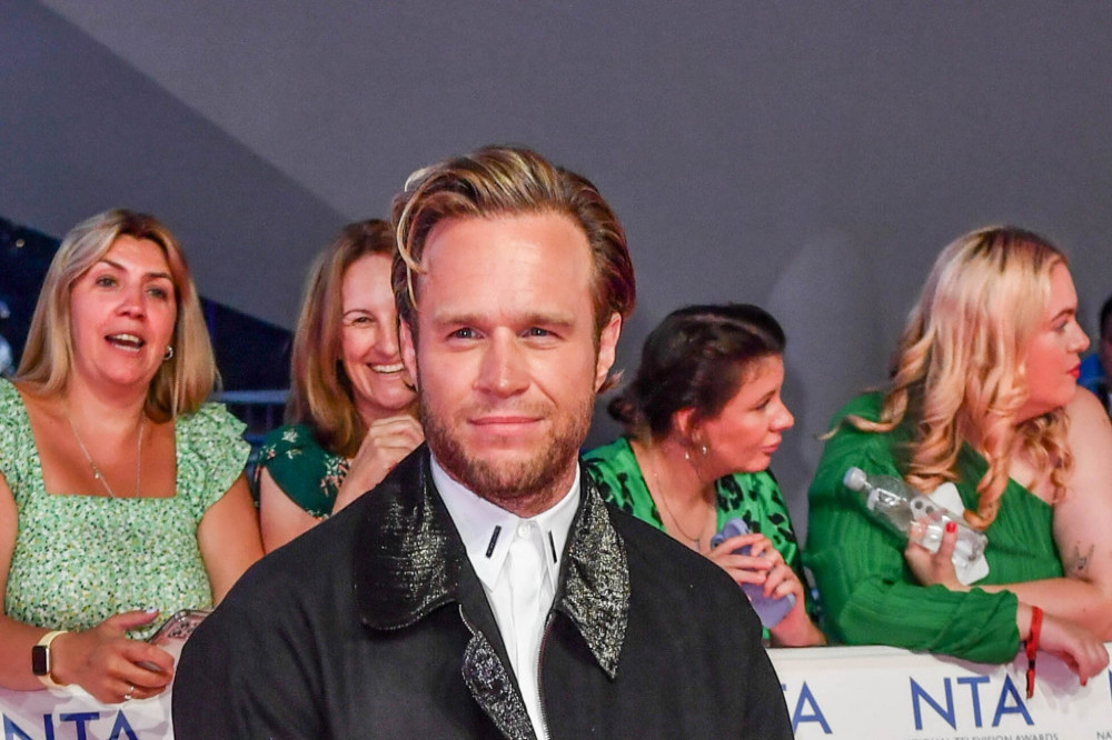 Olly Murs thinks of himself as  DILF now