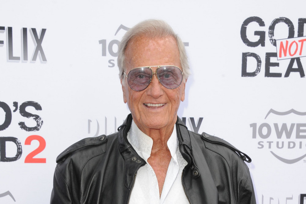 Pat Boone hails Elvis' notorious manager 'a hustler'