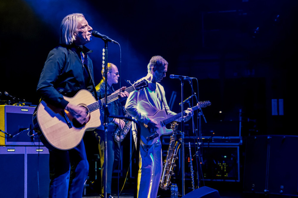 Paul Weller and guitarist Steve Cradock performing in London