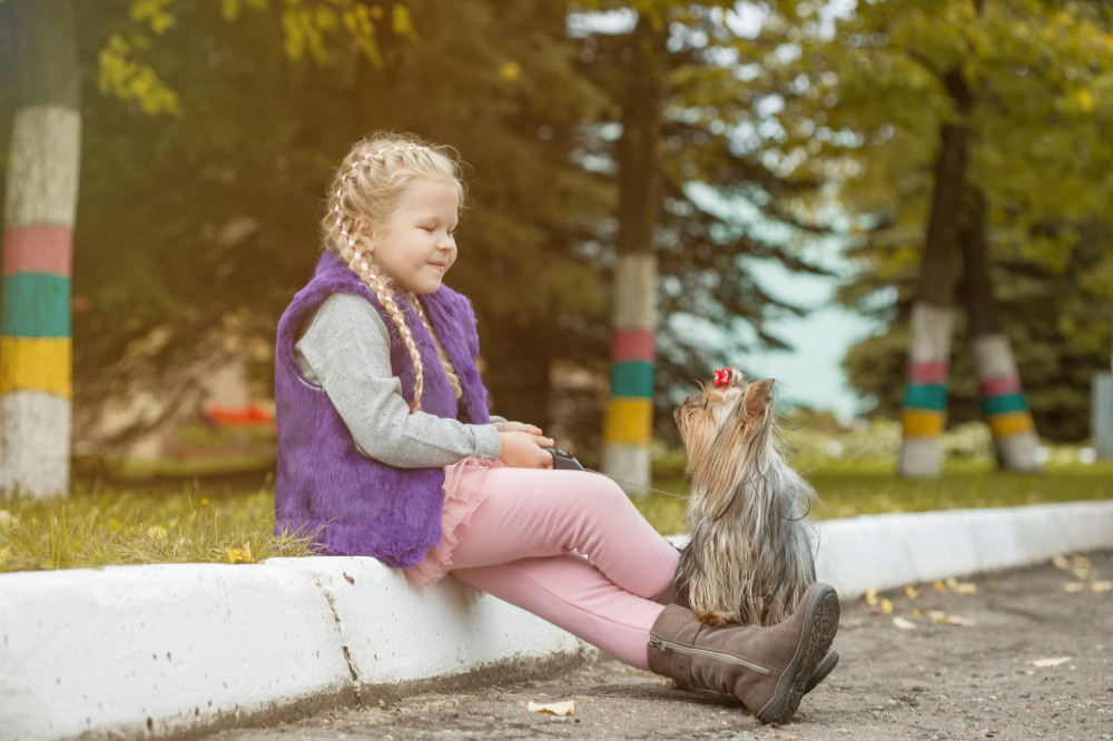 Playing with dogs makes children happy