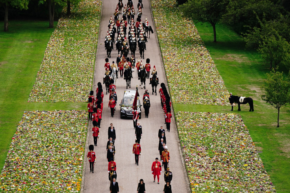 Queen Elizabeth's favourite horse Emma pays a final farewell to the late monarch