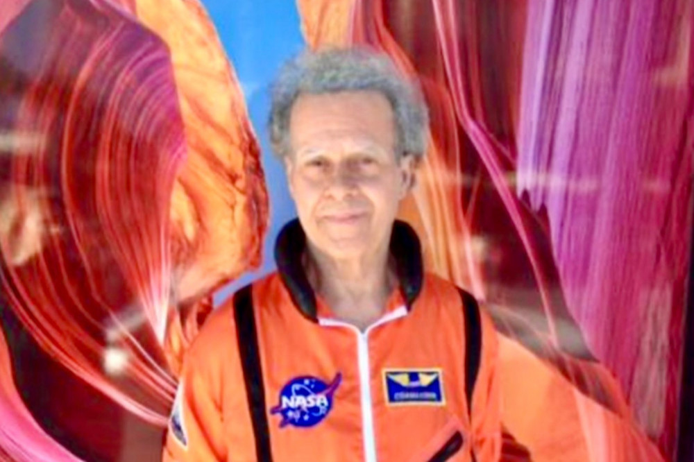 Richard Simmons told fans he wanted to fly them to the moon for star-gazing in a caption on his last photo – which showed him in an orange NASA spacesuit