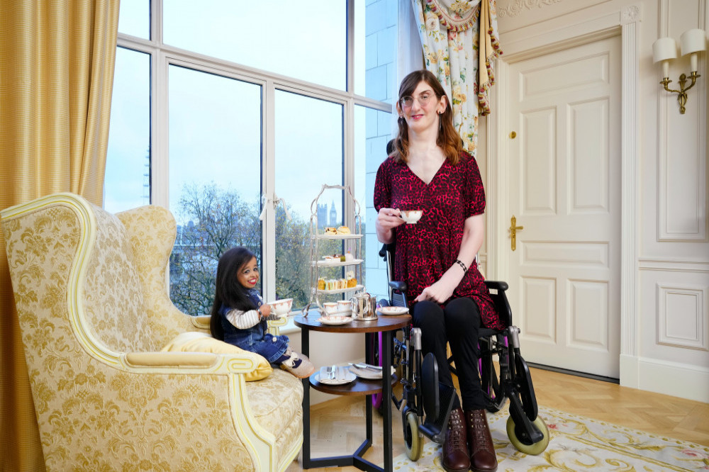 Rumeysa Gelgi and Jyoti Amge enjoying afternoon tea at The Savoy