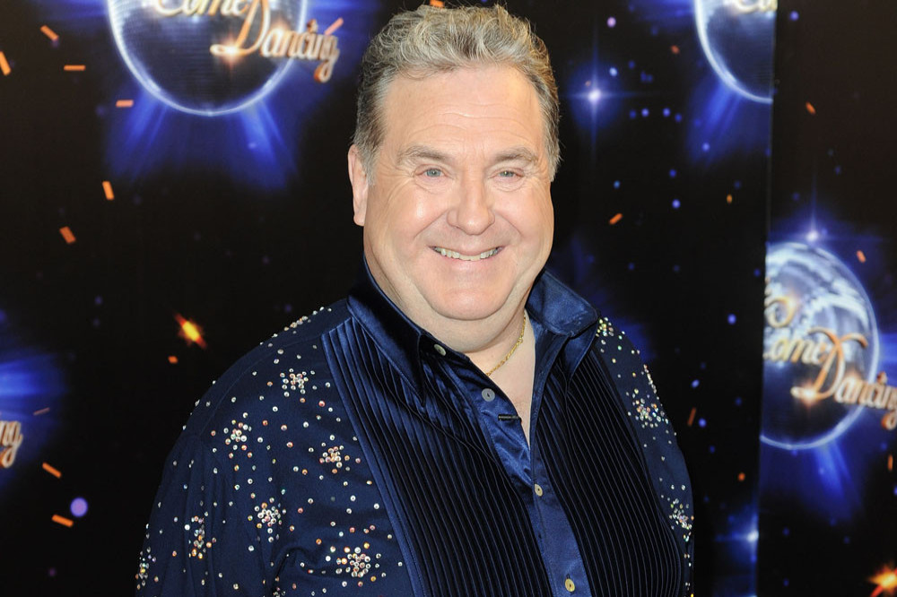 Russell Grant's eyesight has been saved after he had surgery to remove a brain tumour