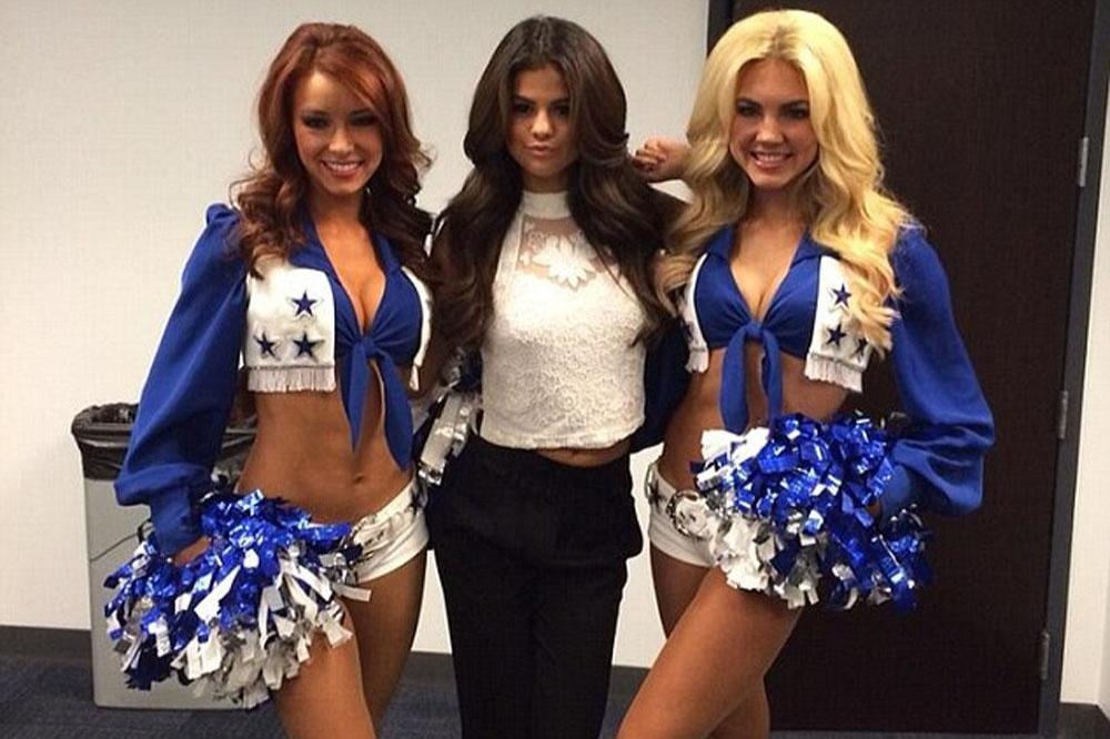 Selena Gomez with cheerleaders