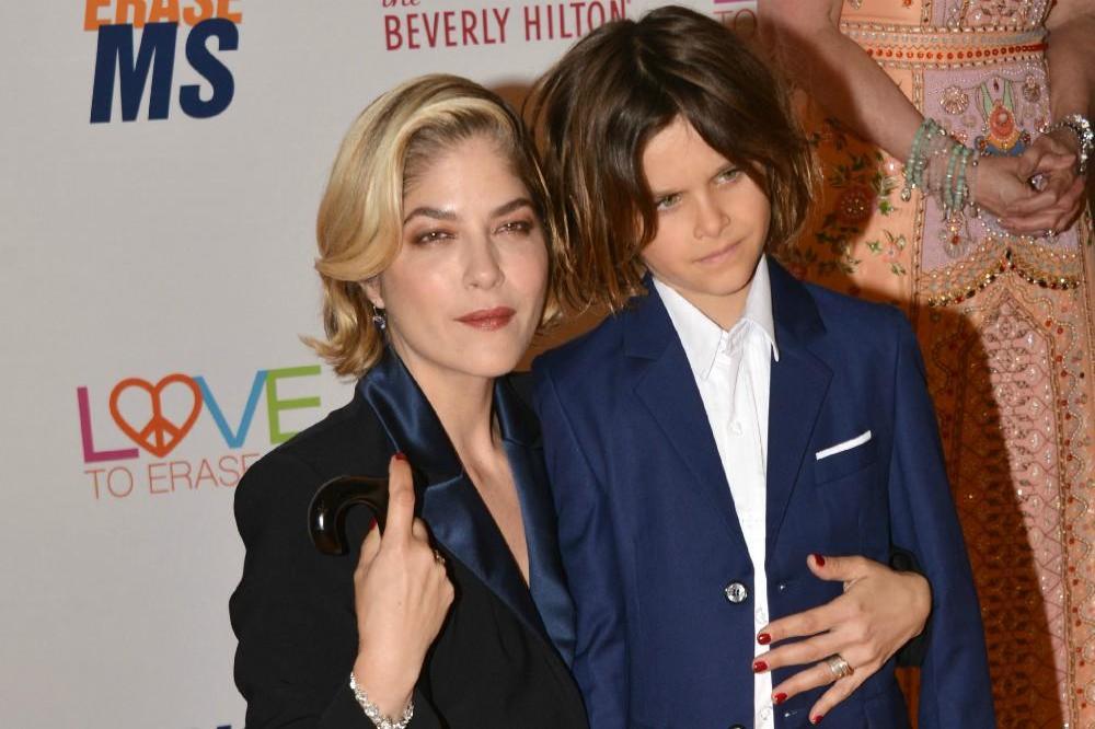 Selma Blair dives naked into pool to get own back on son