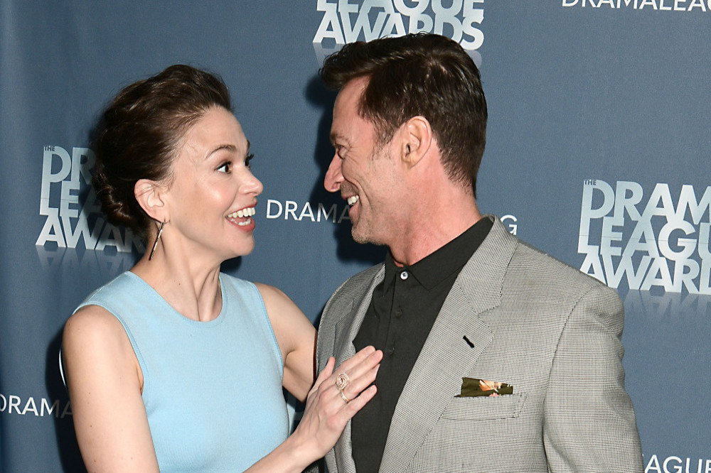 Sutton Foster and Hugh Jackman were seen holding hands