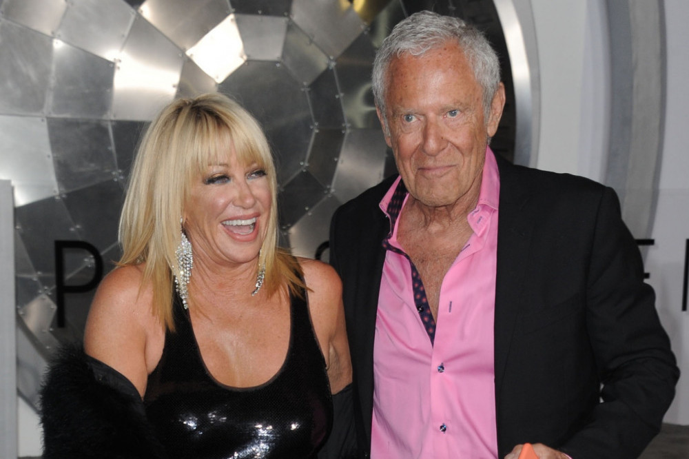 Suzanne Somers’ widower Alan Hamel feels her ghost lying beside him