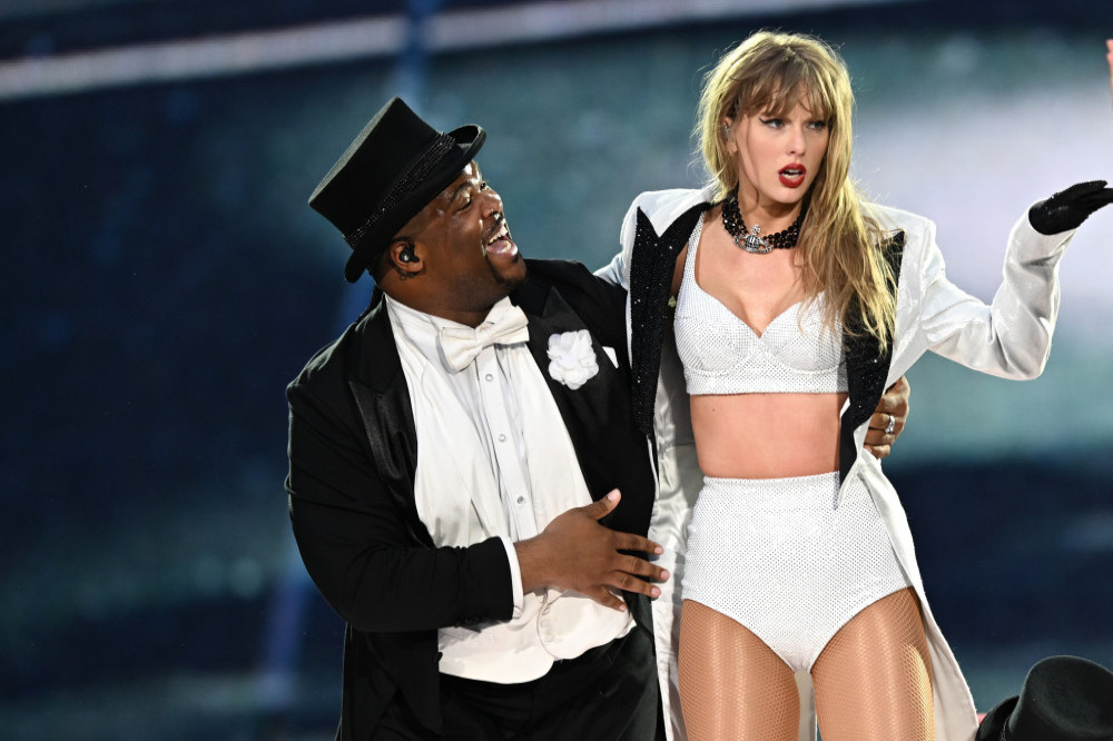 Taylor Swift's tour dancer Kam Saunders is ok after taking a nasty tumble on stage