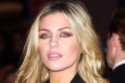 Abbey Clancy has been spotted presenting on TV with her bracelet on