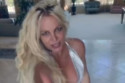 Britney Spears dances as she appears to celebrate being single