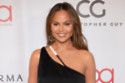 Chrissy Teigen invited Carl Radke onto her private jet