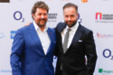 Michael Ball and Alfie Boe share a clap before going on stage